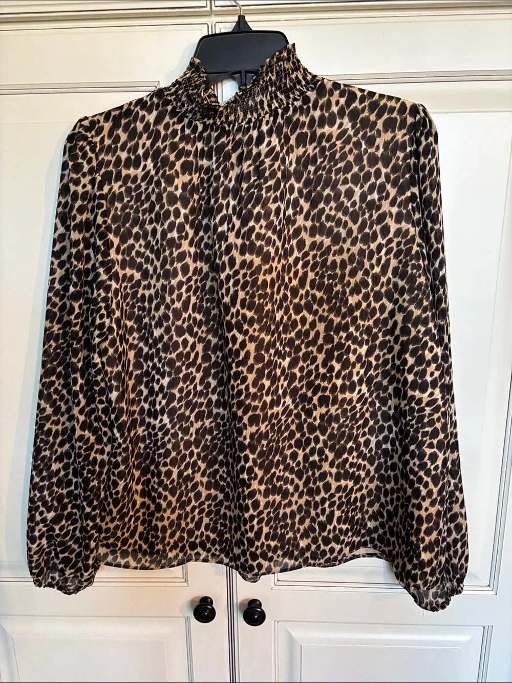 J Crew trendy animal print blouse with sheer sleeves and smocking at neckline
